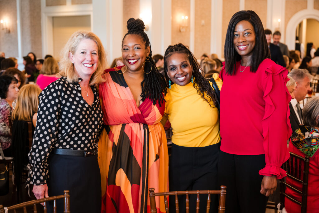Jennifer Smith, Margot Butler, Mia Mends, Sherise Curd at the seventh annual 'Build The Village' luncheon benefiting EMERGE. (Photo by Rob Greer)