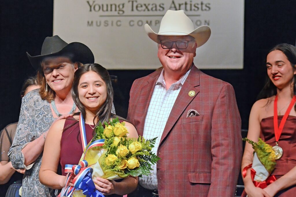 Saxophonist Rachel Jimenez with Paula Hardman and Conroe City Councilmember Harry Hardman (to her left and right) shortly after they presented her with the Audience Choice Award at the 2024 Young Texas Artists (YTA) Music Competition Finalists’ Concert & Awards program. Jimenez also won the Gold Medal in Winds, Brass, Percussion, Harp & Guitar. (Photo by David Hopper)