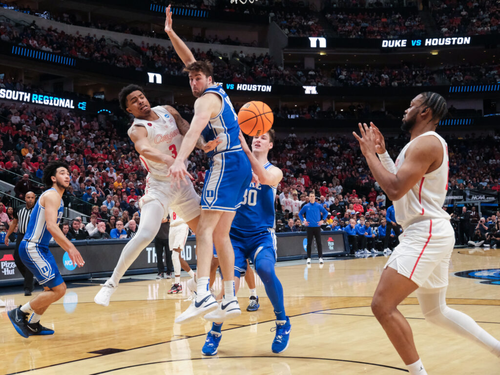 Ramon Walker Jr. can be creative with the basketball for Houston too. (Photo by F. Carter Smith)