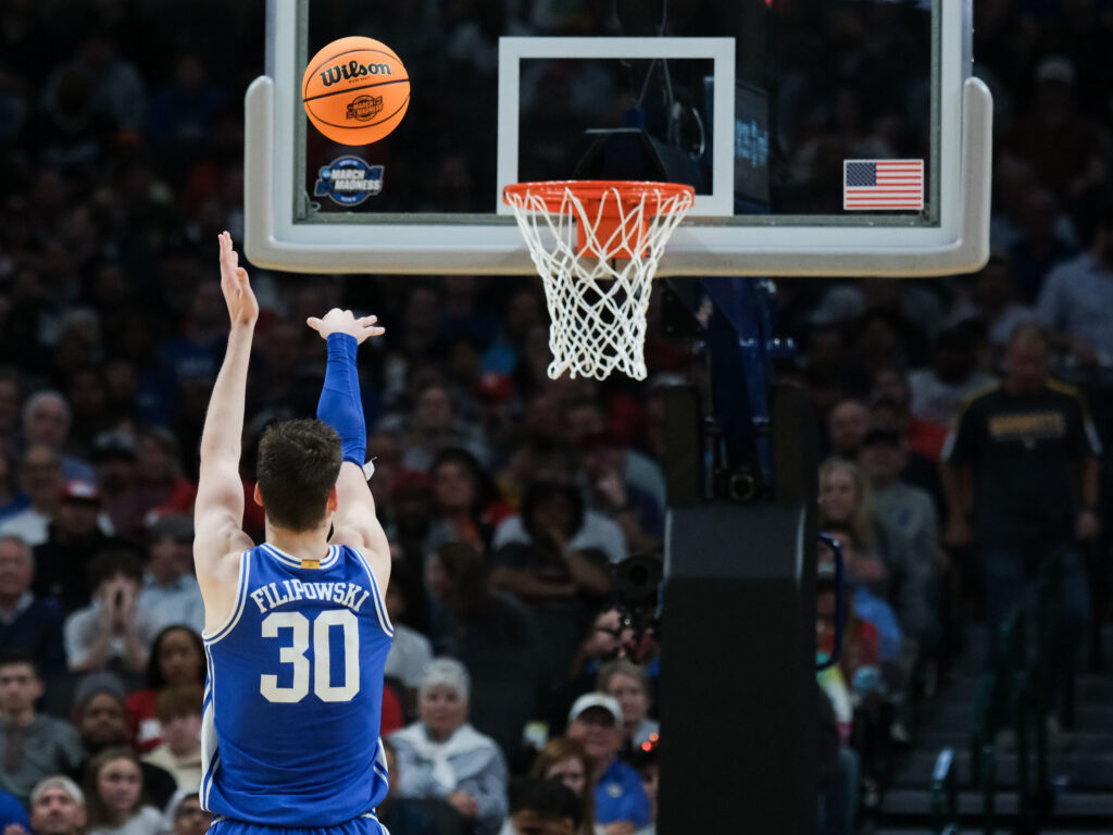 Kyle Filipowski hit just enough threes for Duke to outlast a crippled Houston team. (Photo by F. Carter Smith)