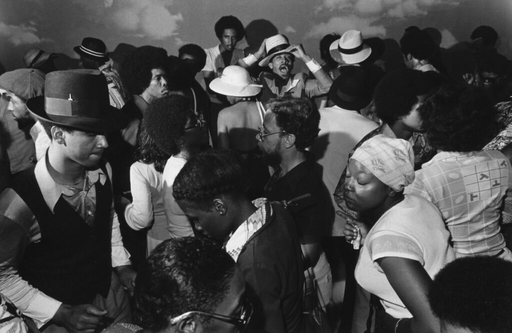 Michael Abramson’s black and white photo “Untitled,” circa 1974-1977. Abramson photographed clubgoers on the South Side of Chicago, and a selection of his photos are currently on view at the Houston Museum of African American Culture through March 30. (Courtesy Abramson Art Foundation and the Houston Museum of African American Culture) Alt Text