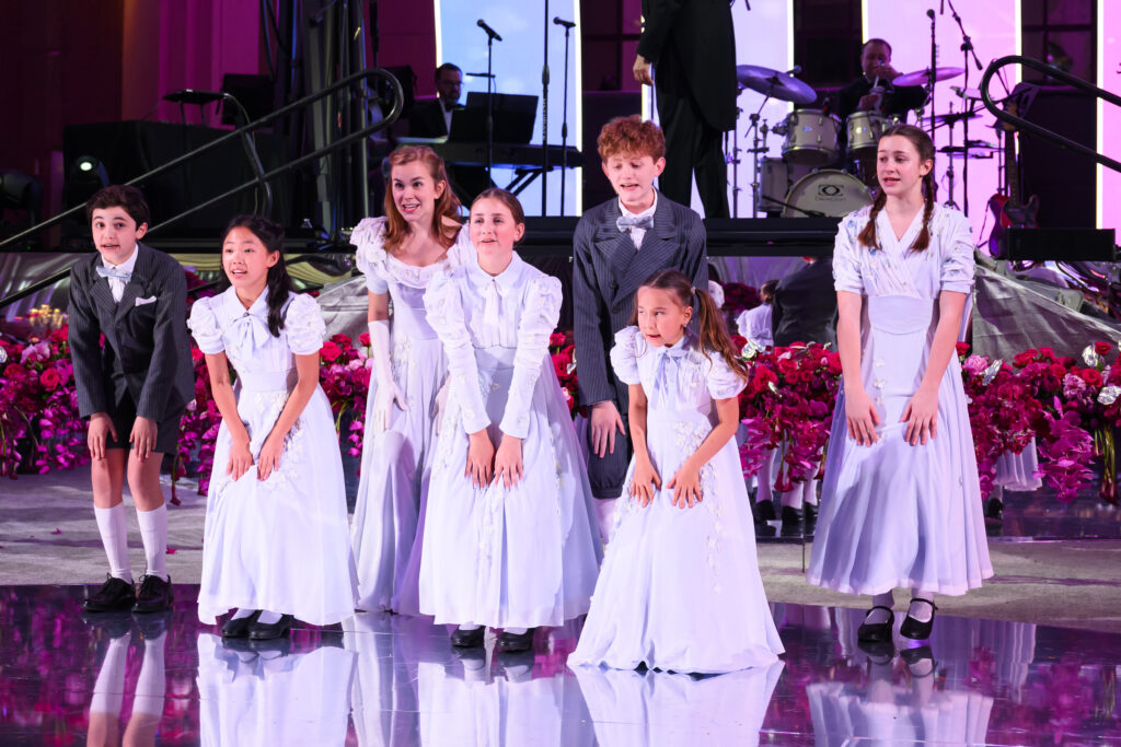 Children from Houston Grand Opera's 'The Sound of Music' production entertain at the HGO ball.  (Photo by Michelle Watson, Catchlightgroup.com)