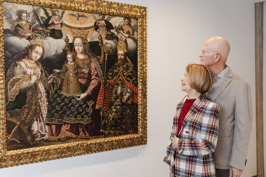 Marilynn and Carl Thoma with "The Mystic Marriage of Saint Catherine of Alexandria," unidentified artist, late 17th century