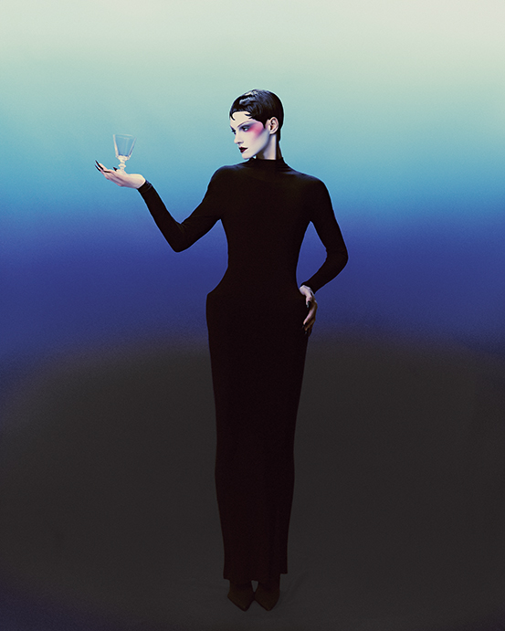 Balenciaga dress $2,790, and Hip Bone Pantabodysuit $5,690, at the Balenciaga boutique, Neiman Marcus. Ichendorf Milano Parigi Wine Glass, $20 at Nickey Kehoe at nickeykehoe.com. 