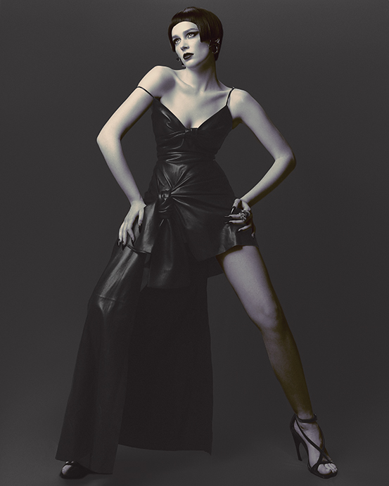 Alexander McQueen dress $7,200, earrings $1,390, ring $7,200, and Armadillo heel, at Alexander McQueen Highland Park Village, Neiman Marcus, Tootsies. 