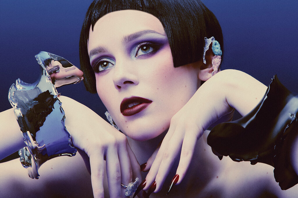 Loewe x Lynda Benglis elephant cuff in silver and black, and glitter bug ear cuff $3,500 at Loewe Highland Park Village. 