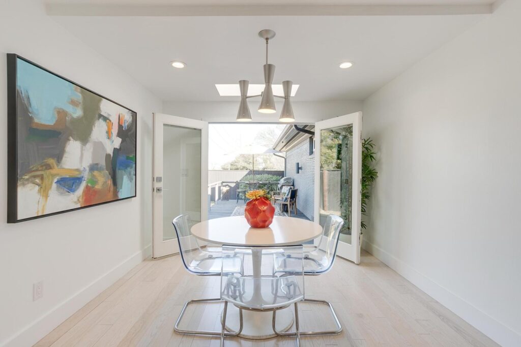 The breakfast nook opens to its own deck for al fresco dining.
