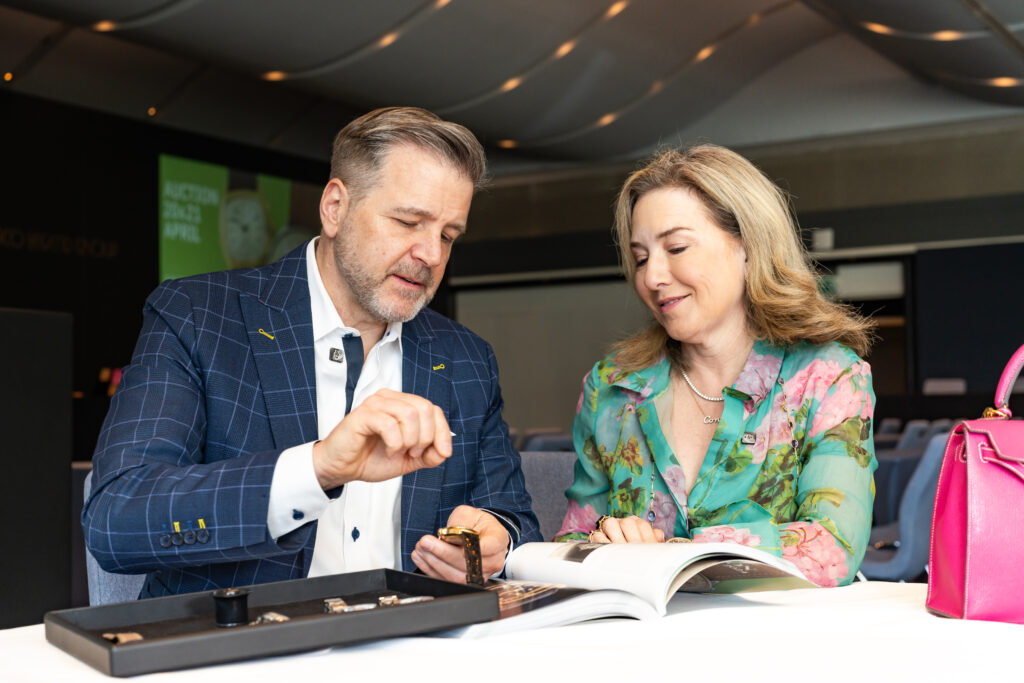 Rob & Donae Chramosta with the The Sir Henry Segrave Patek Philippe watch that sold for $1.85 million at the Monaco Legend Group’s Exclusive Timepieces Auction. (Courtesy photo)