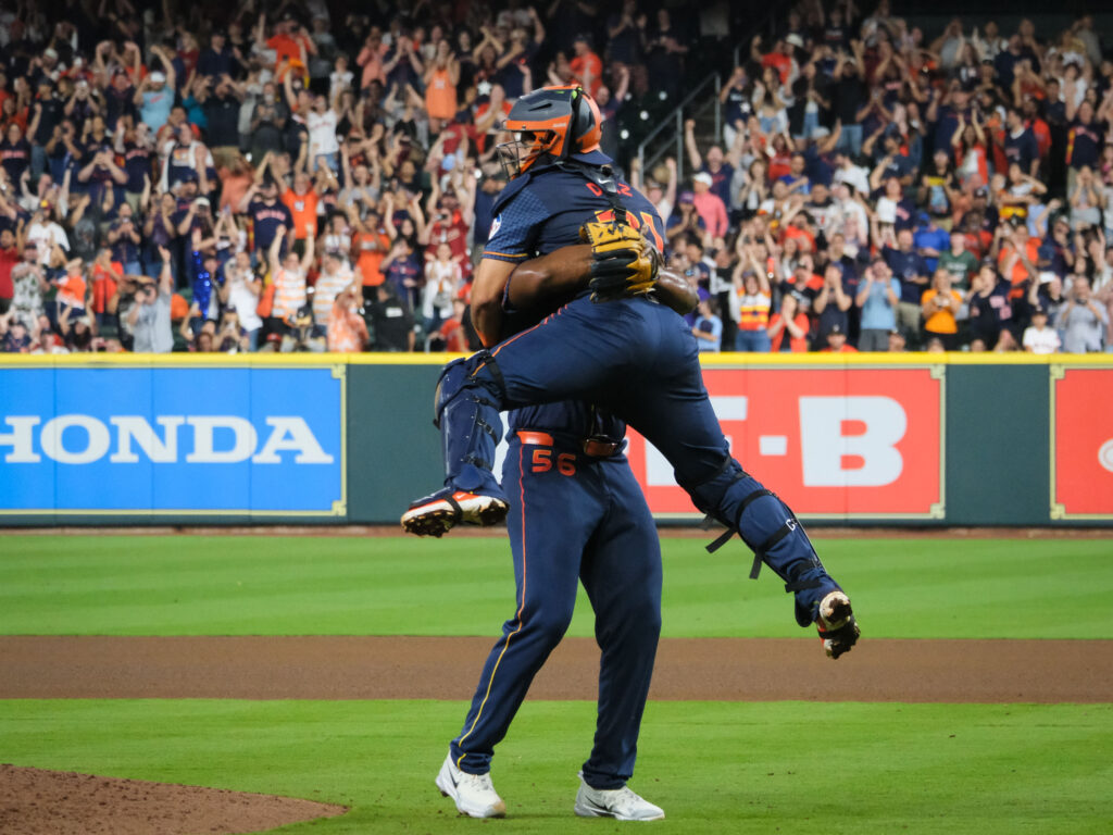 Houston Astros fifth starter Ronel Blanco is a strong man. A man strong enough to throw a no hitter against the Blue Jays. And to lift sturdy catcher Yainer Diaz clean up in the air. (Photo by F. Carter Smith)