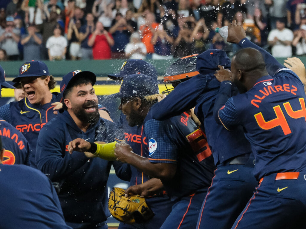 Ronel Blanco found himself mobbed and sprayed with water by Astros teammates like Yordan Alvarez after throwing a no hitter. (Photo by F. Carter Smith)