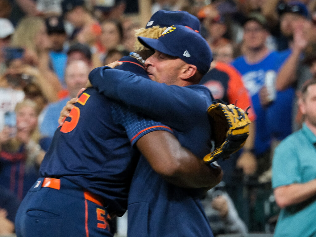 Ronel Blanco and Astros manager Joe Espada shared a long embrace after the 30-year-old journeyman's epic no hitter. (Photo by F. Carter Smith)