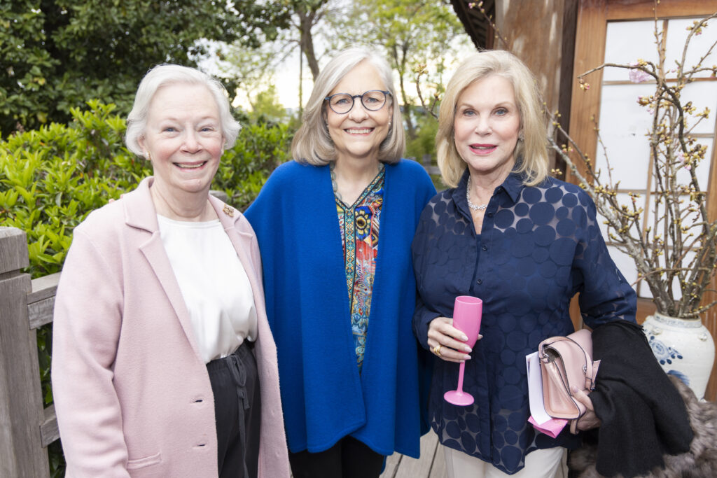Mary Lynn Garrett, Maurie Reynolds, and Judy Koslow attended the annual evening in the garden. (Photo by Sharon Ellman)