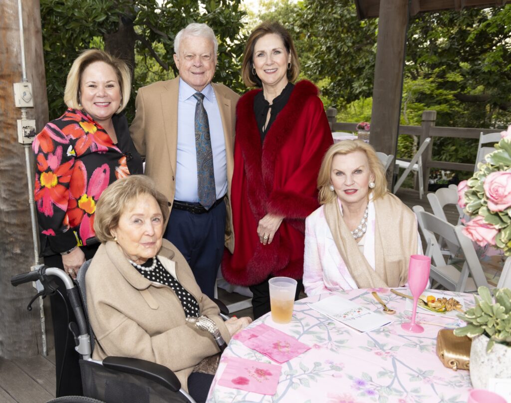 Virginia Smith, Amy Havranek, Bruce Street, Dee Lynn Aguilar, and Donna Street enjoy an evening in the garden. (Photo by Sharon Ellman)