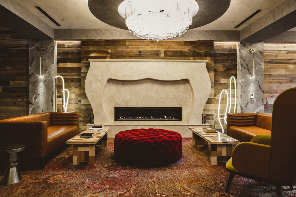 The Bobby Nashville lobby features a cozy lounge area with a fireplace. (Courtesy)