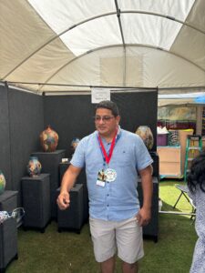 Luis Gutierrez lives in North Carolina. He was awarded Best in Show in Ceramics. (Photo by Laura Landsbaum)