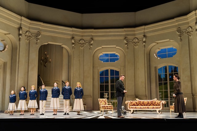A large cast of young actors round out the von Trapp family. (Lora Uvarova, Abigail Lee, Macie Joy Speer, Antonio Rico, Annie Vorhees, Peter Theurer, Tori Tedeschi Adams with Alexander Birch Elliott as the Captain and Isabel Leonard as Maria. (Photo by Michael Bishop)