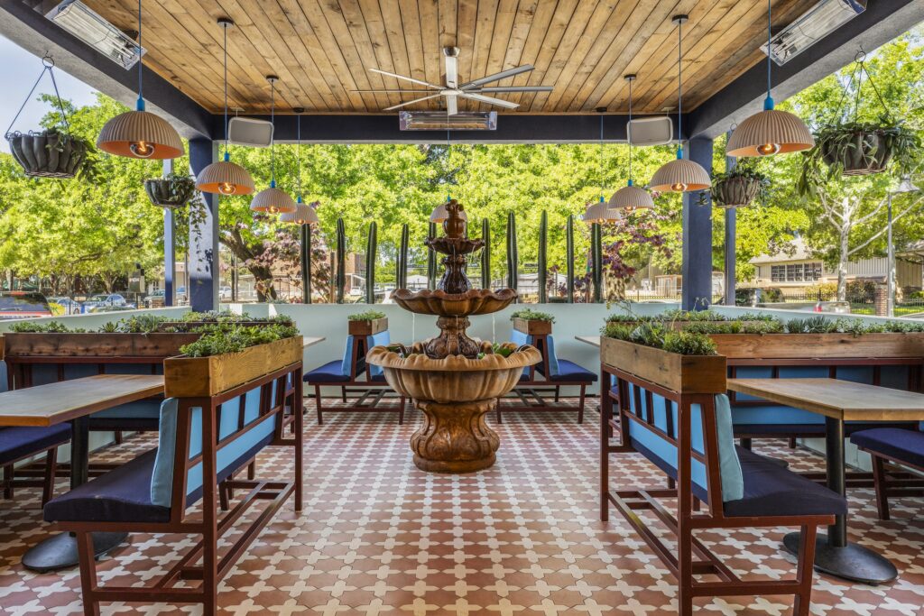 When the weather cooperates, you can take advantage and dine outdoors on Maximo's covered 35 seat patio bordered by a hedge of cacti. (Photo by Julie Soefer)