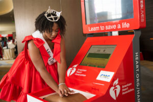 New CPR Kiosk allowed Miss. Denton to practice Hand-Only CPR