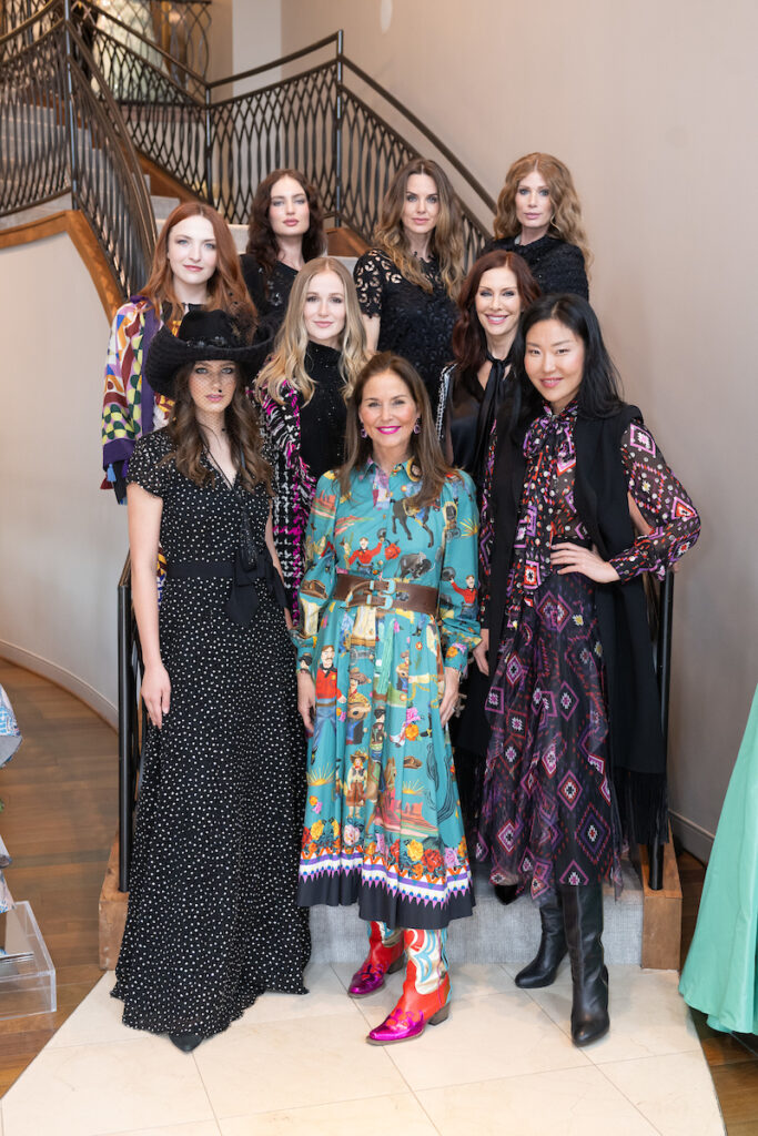 Designer Rieke Common poses with models wearing her Wild Wild West collection at Elizabeth Anthony. (Photo by Wilson Parish)