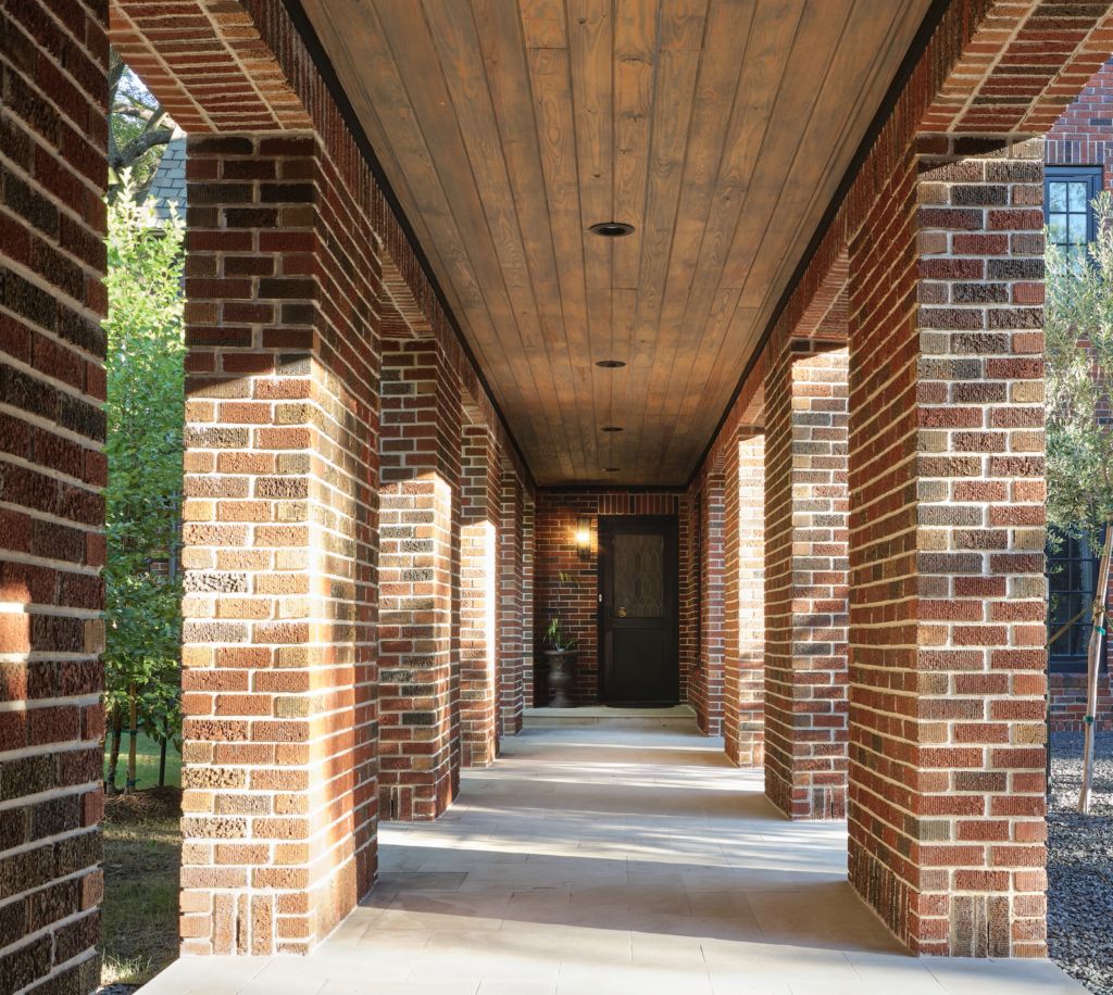 Creating a covered walkway was quickly identified as a key project objective. (Photography by Leonid Furmansky)