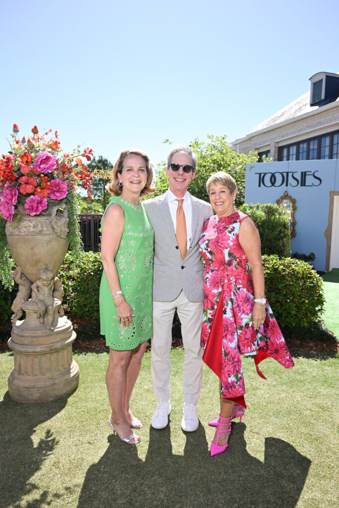 Susie McGee, Craig Lidji, Donna Lewis at the River Oaks tennis tournament luncheon.
