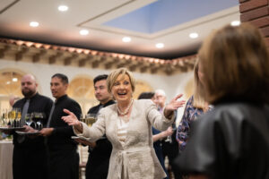 Suzie Johnson greets attendees (Daniel Ortiz)