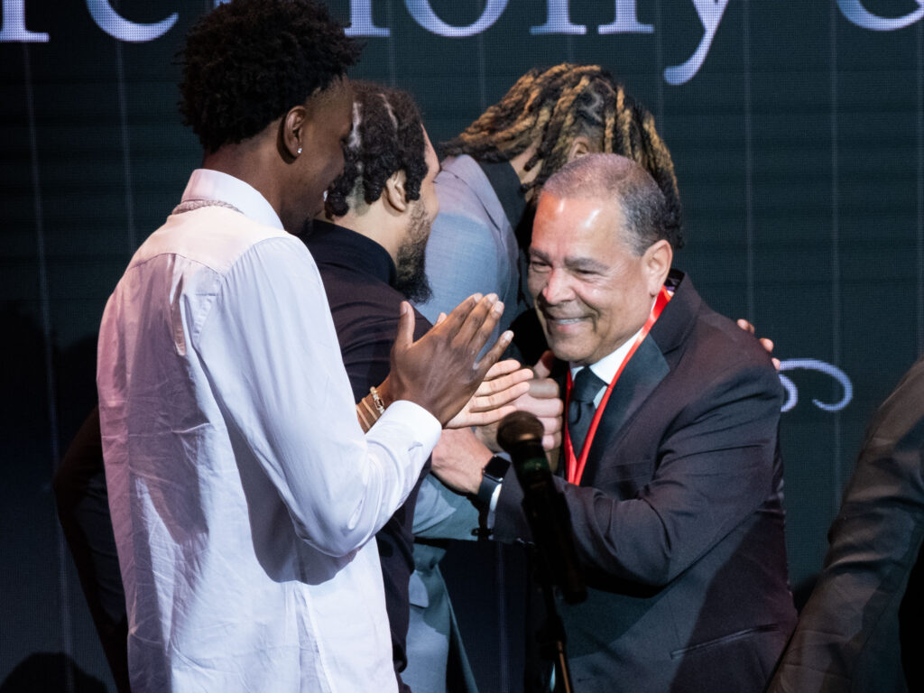 University of Houston basketball coach Kelvin Sampson enjoyed having his players Terrance Arceneaux, Emanuel Sharp and Ja'Vier Francis surprise him at the UH Alumni Awards. (Photo by F. Carter Smith)