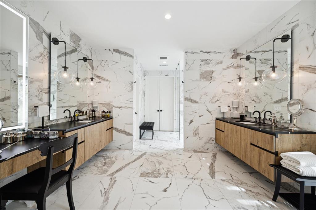 The marble master en-suite spa bathroom is ideal for self care days. (Photo by TK Images)