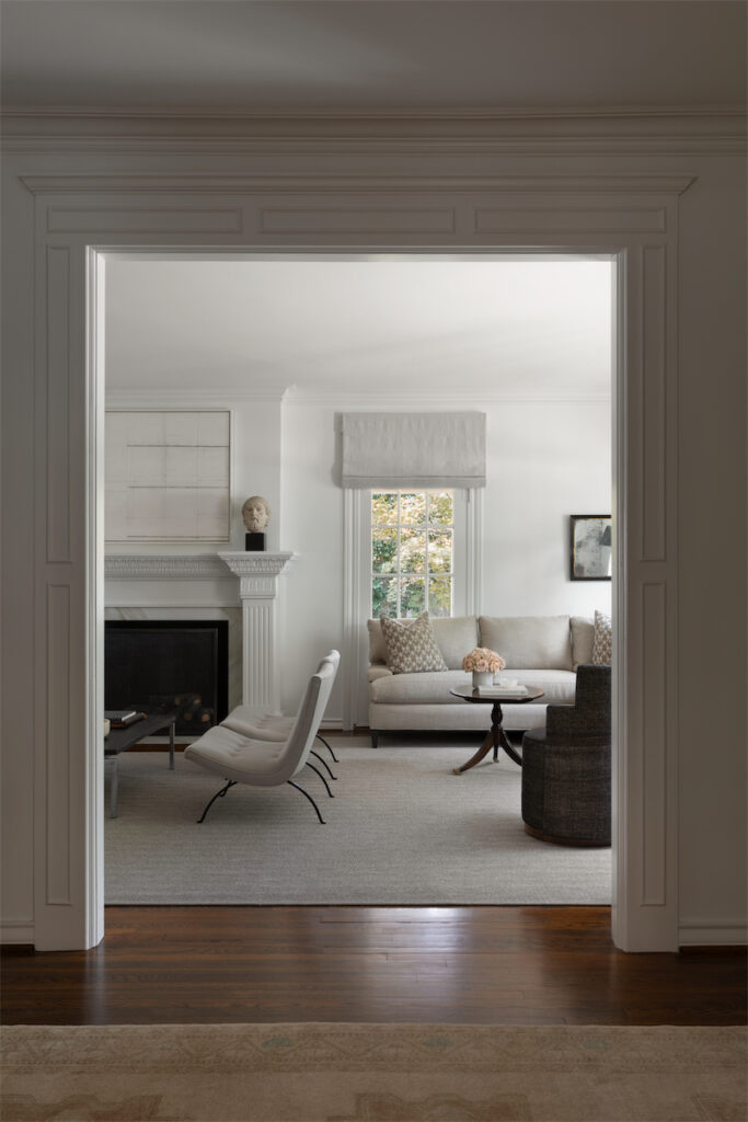 Restored millwork frames a view into the living room. (Photo by Trevor Parker)