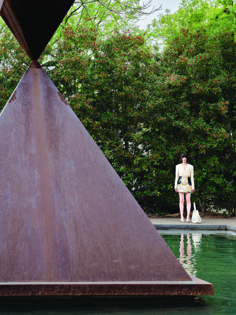 Louis Vuitton V-neck long-sleeve shirt, skirt, Low Key hobo MM $3,600, and Blossom slingback pump $990. 