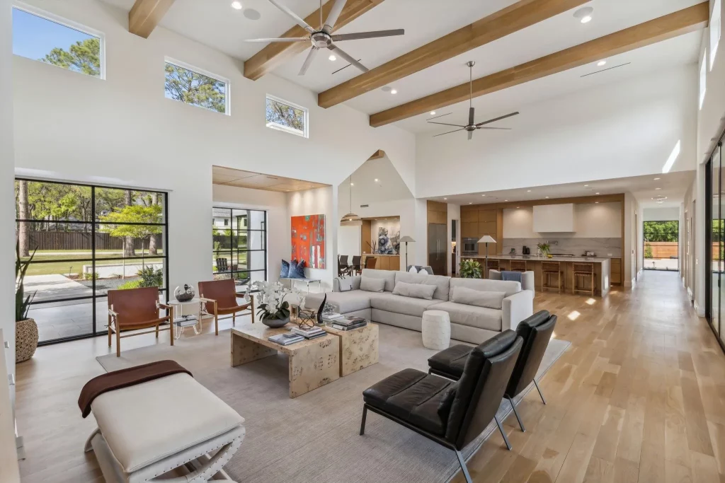 The great room has endless flow to the formal dining and custom kitchen.