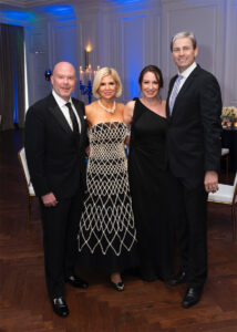 2024 ReuNight co-chairs James and Kristin Hallam and Annie and Erik Miller