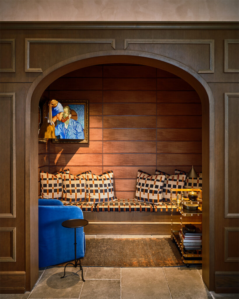 A piece by street artist Hijack sits appropriately in "The Kissing Booth."