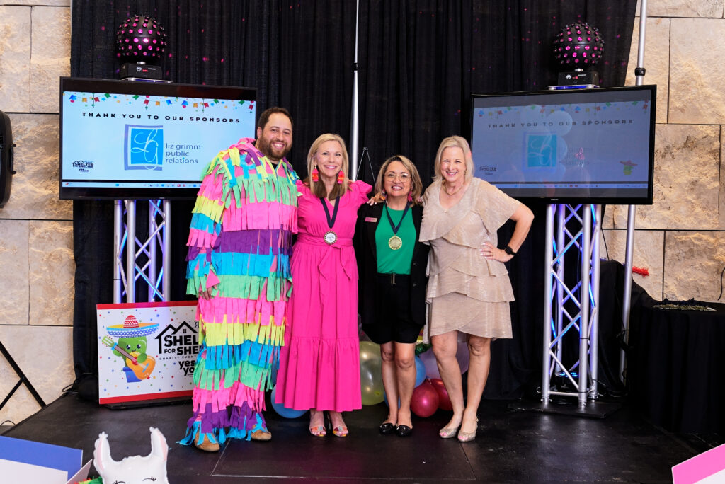 Zach Richmond, Ann Wolford, Pam Bunn and Marlys Mulkey stand up for Yes to Youth.