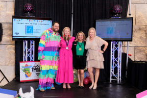 Zach Richmond, Ann Wolford, Pam Bunn and Marlys Mulkey stand up for Yes for Youth,