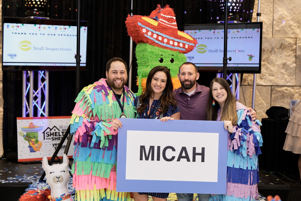 Zach and Rachel Richmond pose with the baby naming raffle winner Courtney Schweitzer and her husband Jason. Zach Richmond, Courtney Schweitzer, Jason Schweitzer, Rachel Richmond. 
 (Photo by Derrick Bryant Photography)