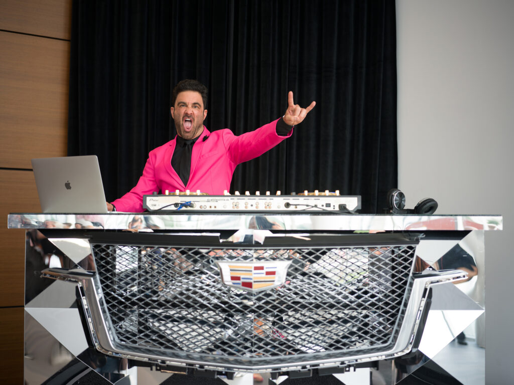 DJ Damon Pampolina at the grand opening of Central Houston Cadillac's new location near NRG Park (Photo by Daniel Ortiz)