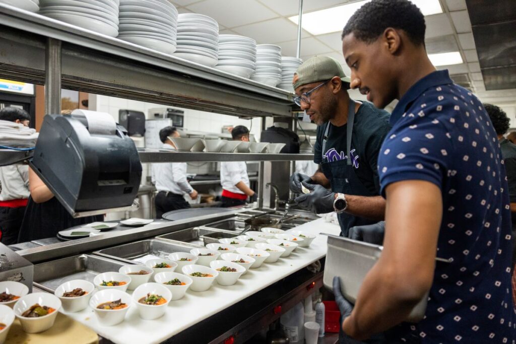 Chef Chris Williams and dancer Eric Best at the Houston Ballet 'Raising the Barre' dinner at Caracol. (Photo by Melissa Taylor)