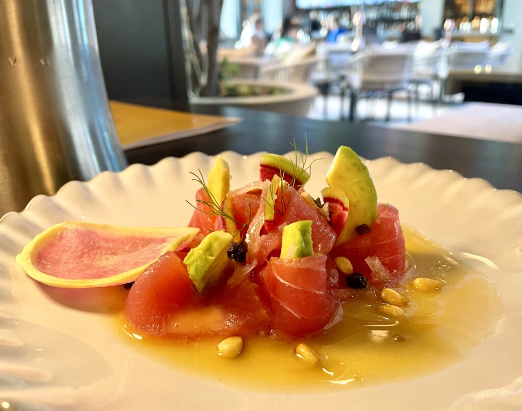 Start with the big eye tuna carpaccio in a citrus vinaigrette at Farena. (Photo by Courtney Dabney)