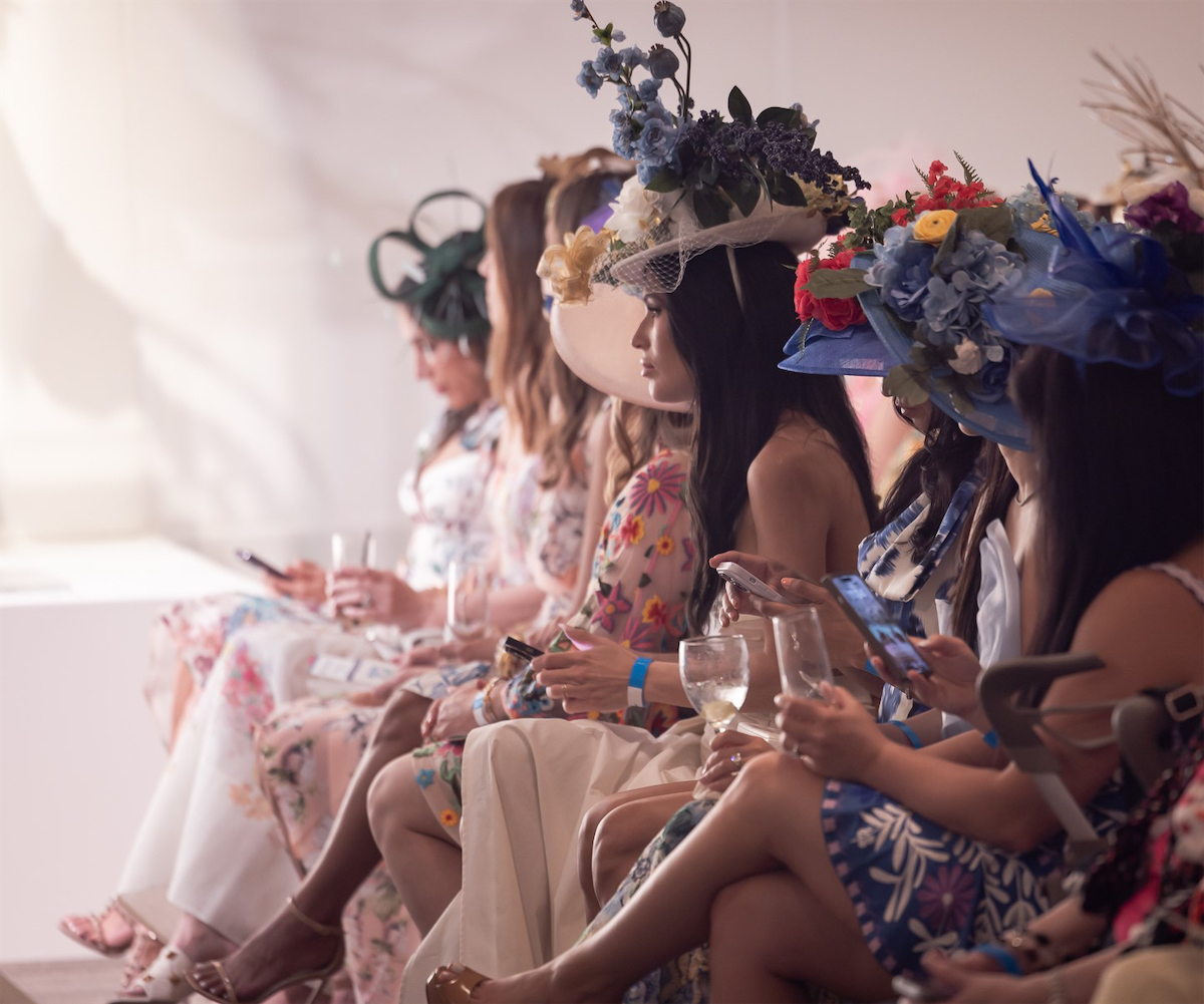 Fashion Show spectators at the 2024 Mad Hatter's luncheon
