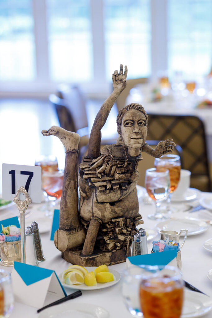 A droll centerpiece sculpture by Clara Hoag at the Houston Center for Contemporary Craft Spring Luncheon 2024 (Photo by Katy Anderson)