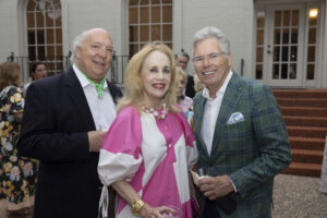 Hidden Gardens – Paul Tripplehorn, Charlotte Tripplehorn, and Mike Mullins enjoy cocktail hour on the patio. (Photo Sharon Ellman)