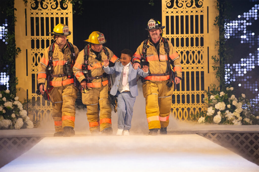 The Highland Park Fire Department with Kewan Gibson (Photo by Tamytha Cameron)