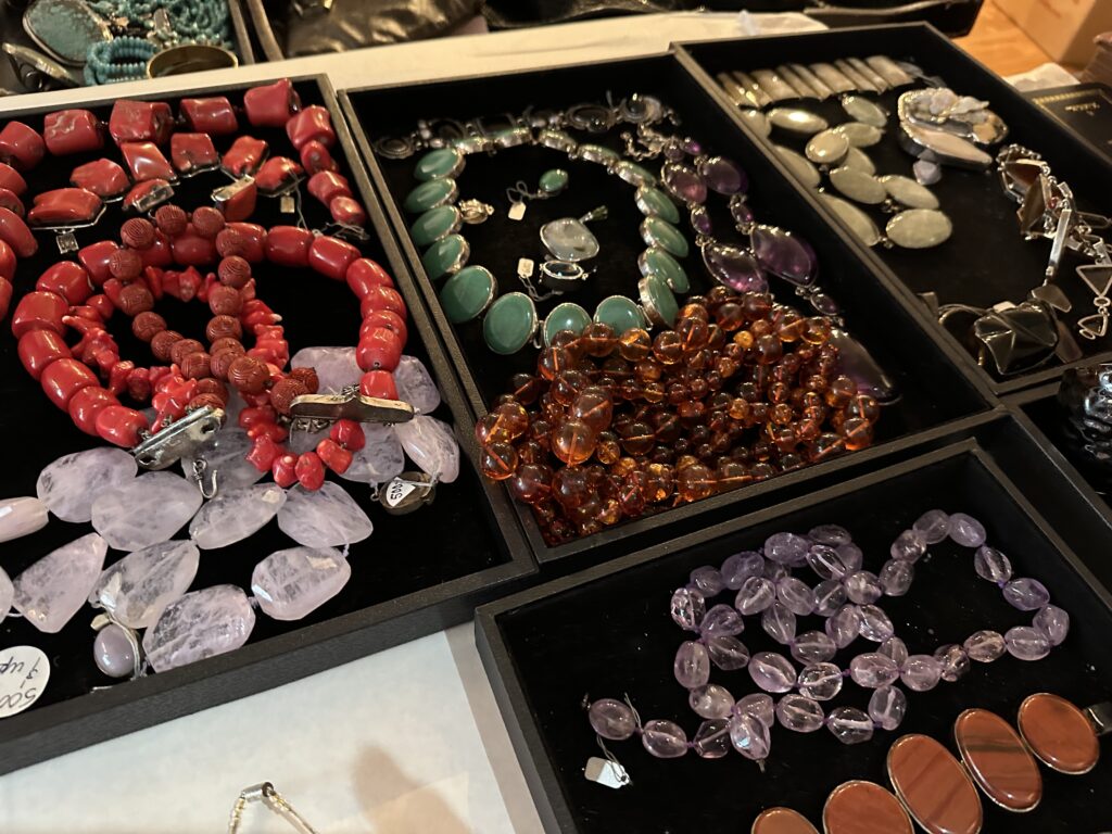 Coral, amethyst, and jade necklaces are among the accessories to be found at the Martha Turner estate sale. (Photo by Shelby Hodge)