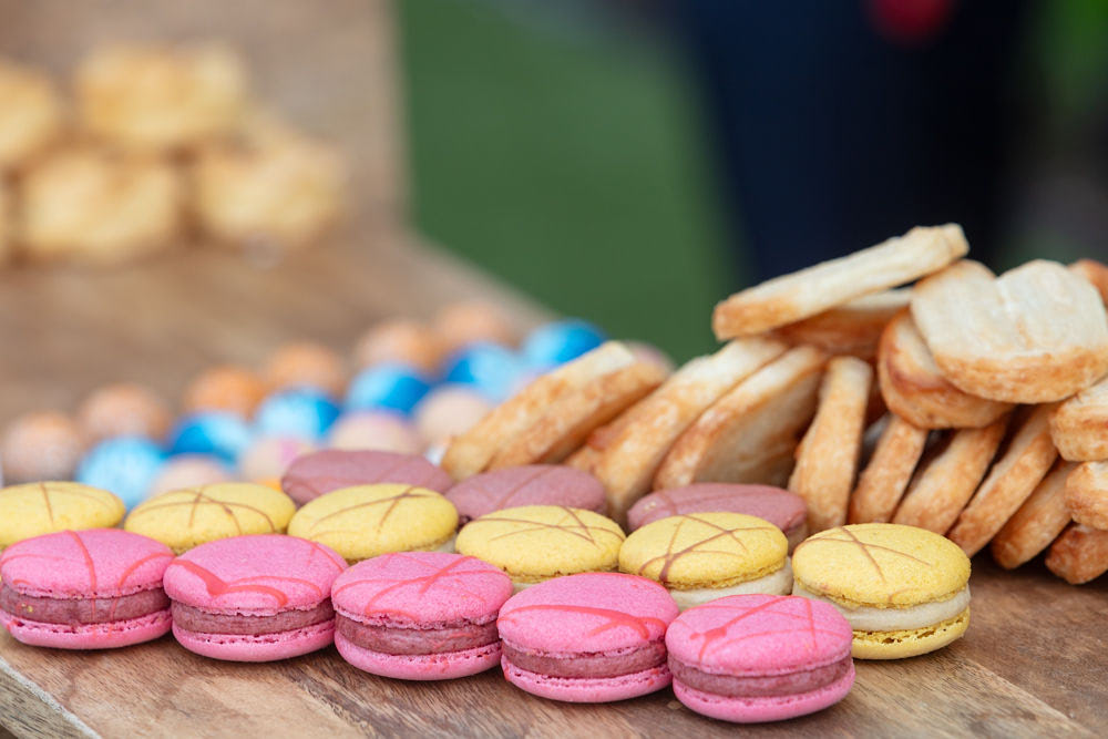 Filled with beautiful handmade creations, the French patisserie station offered macarons, eclairs, berry tarts, and more. (Photo by Clint Brewer)