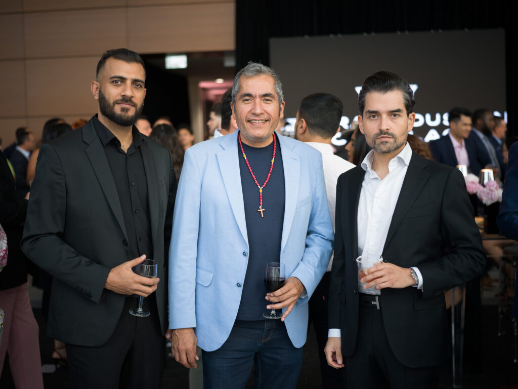 Mustafa Altamimi, Jorge Olivares, Gerardo Ortega at the grand opening of Central Houston Cadillac's new location near NRG Park (Photo by Daniel Ortiz)