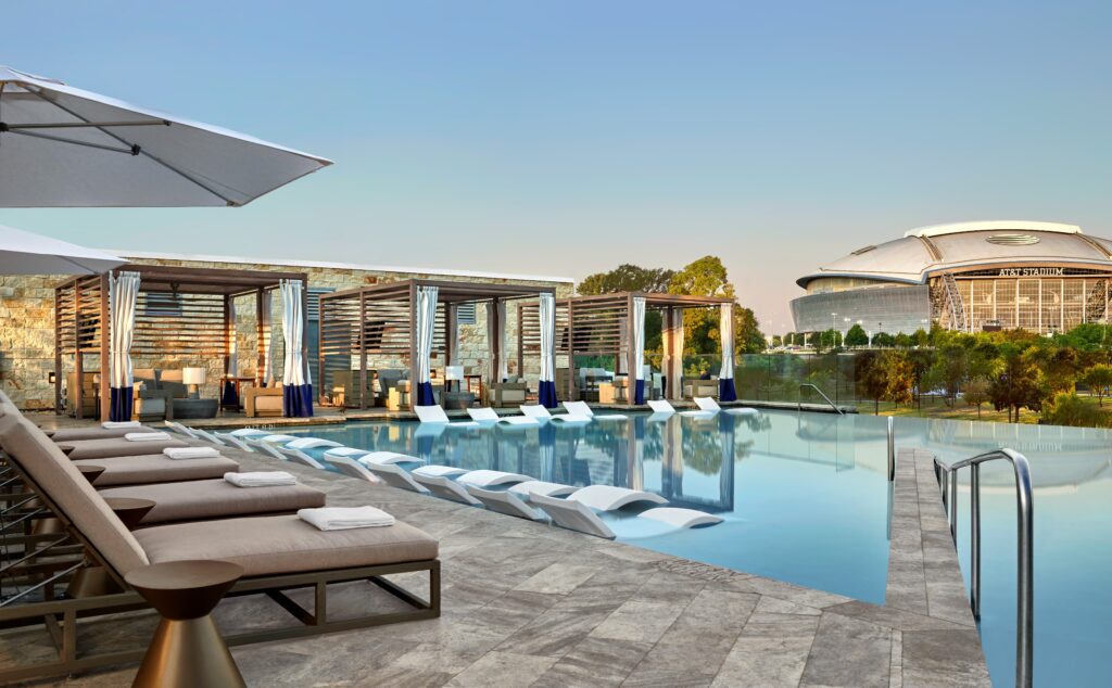 Live! by Loews poolscape with its sporting view of AT&T Stadium.