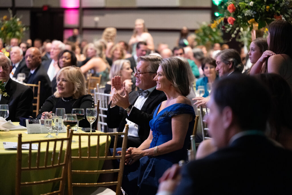 Guests attentive to the live auction at the JDRF Houston 'Promise Ball' at the Hilton Americas-Houston
