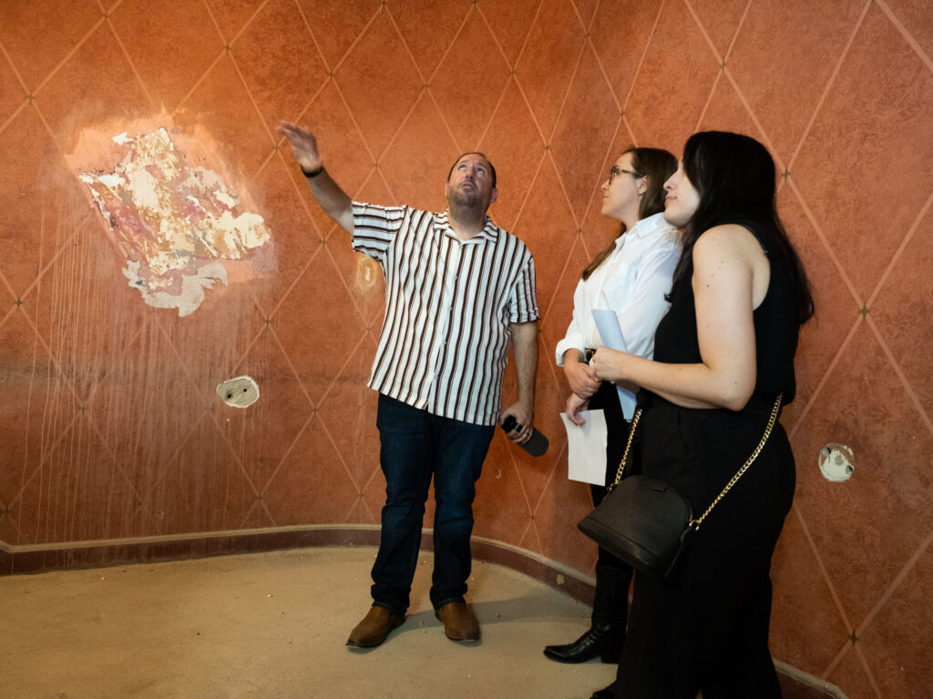 Culinary Khancepts vice president of development Jason Ostrow shows off some of the changes at the River Oaks Theater. (Photo by F. Carter Smith)