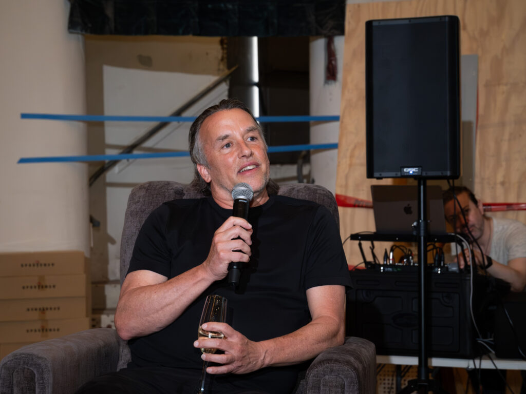 Director Richard Linklater sits in his chair at Houston's historic River Oaks Theater, which has been renovated and brought back to life. (Photo by F. Carter Smith)
